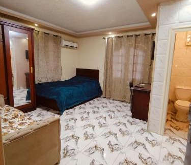 6th of October City House | غرف و استديوهات منفصلة مفروش غرفة ماستر بحمام ومطبخ صغير لا يتشارك مع الغير اي شيء بنات فقط أو عوائل