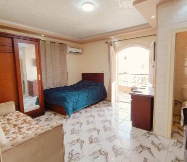 6th of October City House | غرف و استديوهات منفصلة مفروش غرفة ماستر بحمام ومطبخ صغير لا يتشارك مع الغير اي شيء بنات فقط أو عوائل