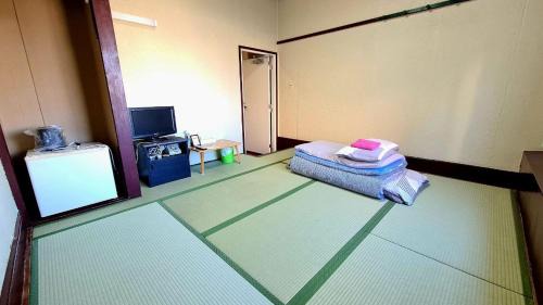 Kadoma House | ビジネス旅館 錦荘 - Nishiki Guest House