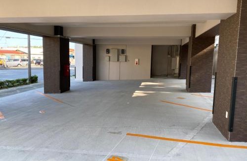 Makiminato Apartment | ホテルトーマス牧港ヴィラ