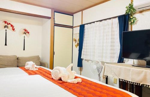Shin-Osaka Apartment | 大阪民宿梅田淀川花b套