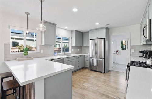 Townsite House | 1.5 miles the beach. Walk to the Pier! Parking and private backyard. Game room