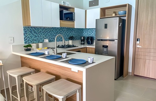 Zona Norte Apartment | 1 Alcoba Hermosa vista a la laguna + bote inflable