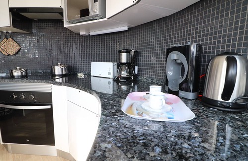 Santa Eulalia Apartment | 1 bedroom apartment with sea view, pool and garage