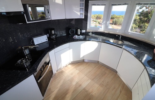 Santa Eulalia Apartment | 1 bedroom apartment with sea view, pool and garage