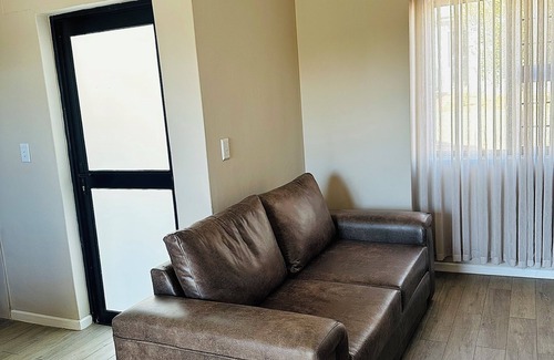 Windhoek Apartment | 1 bedroom apartment with stunning mountainous and sunset views.
