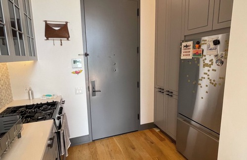Greenpoint Condo | 1-bedroom on waterfront in Brooklyn with Balcony, Rooftop, Gym, WiFi, Top Floor!