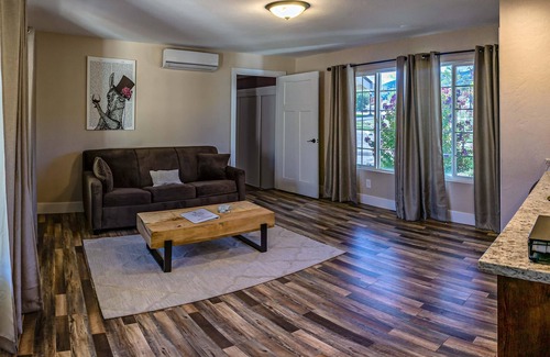 Medford Apartment | 1 bedroom with a king-size bed, one bathroom, and kitchenette.