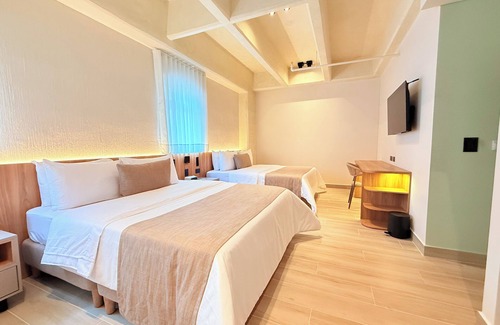 Sabaneta Hotel | 1 minute from Sabaneta Park! Modern rooms, breakfast included,