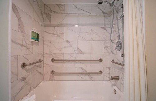 Ocala Hotel | 1 Queen Suite at Equus Inn, Pets Allowed, Seasonal Pool, Free Breakfast