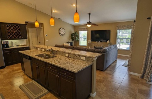 Englewood East House | 10 Minutes to Beach Bliss, with Heated Privet Poolside Haven!