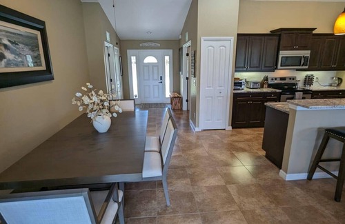 Englewood East House | 10 Minutes to Beach Bliss, with Heated Privet Poolside Haven!