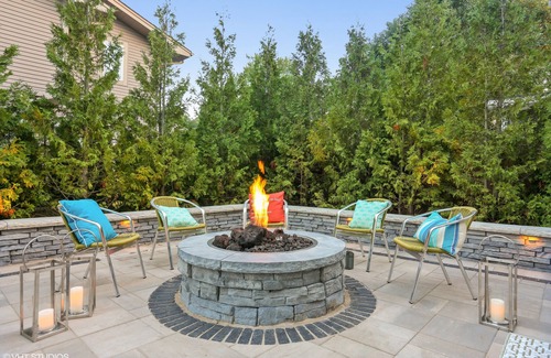 Michigan City House | 100 steps to Lake Michigan beach, private paved courtyard, gas fire pit.
