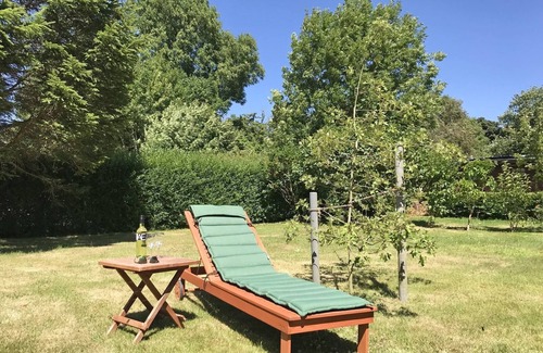 Kopperby Apartment | 110m² large, charming vacation apartment "Schleistern" with wood-burning stove and large, lovingly planted garden with old trees, only 400 m from the Schlei, is wonderfully suited for couples and families who want to get away from the hustle and bustle of