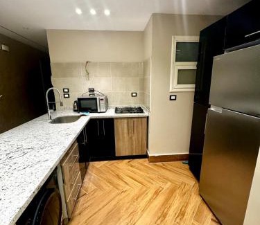 Madinaty Apartment | 124/4/32 · Luxurious 3BR-Stunning Patio&View+5G Wifi Madinaty