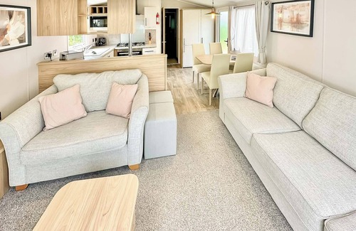 Cross Inn House | 12ft-wide luxury caravan with one double with en suite shower and one twin.