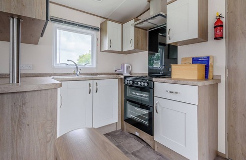 Skegness House | 12ft-wide very comfortable and spacious caravan with one double and two twin.