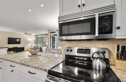 West Beach Village Condo | 1328 Fairway Oaks: 4BR with Golf Views, Close to Beach, Beach Gear/Bike Credit