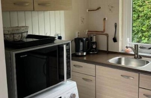 Sint Maartensvlotbrug House | 15-minute bike ride from the sea! Lovely vacation bungalow with spacious garden.