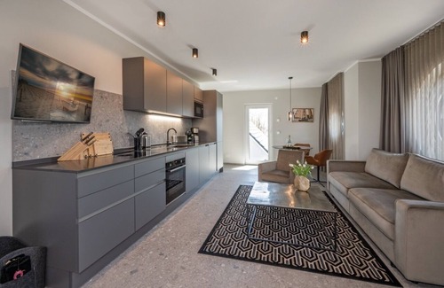 Lubmin Apartment | 150m to the beach! Modern 60m² sea view apartment: balcony & fireplace, for 4 pers.