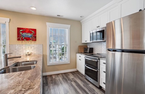 Buck Island Apartment | 1606 - Shades of Sand, a spacious 4-bed 4.5-bath Corolla, NC, hot tub, perfect for up to 9 guests.