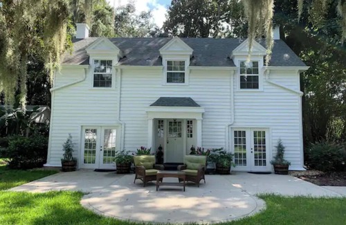 Green Cove Springs House | 1920 Carriage House on Private 5 Acre Riverfront Parklike Estate with DOCK