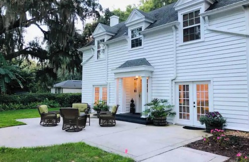 Green Cove Springs House | 1920 Carriage House on Private 5 Acre Riverfront Parklike Estate with DOCK