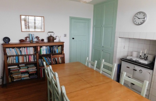 Ty Croes House | 1930's bungalow nr Rhosneigr, opposite beach, large garden and amazing views.