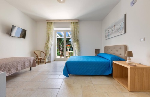 Pittuini Bed & Breakfast | 1977 B&B I Tarocchi - La Papessa Camera Quadrupla