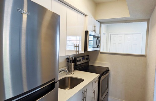 Deerfield Beach Apartment | 1BR Beach Walk With Pool 201 | Sleeps up to 4
