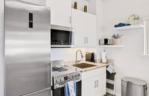 New Smyrna Beach House | 1st-floor beachfront home with outdoor shower, patio, grill, ocean & beach views