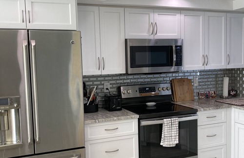 Bonita Springs Condo | 1st Floor Condo with community pool & 1 dedicated carport space