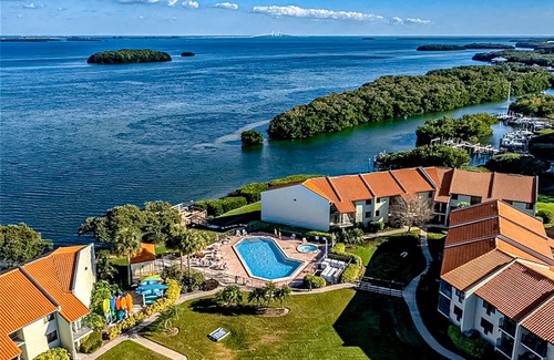 Tierra Verde Condo | 1st-floor condo with bayfront views, pool, hot tub, gym, grills, & balcony