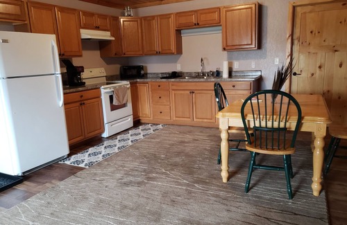 Pukwana House | 2 bdrm, 3 beds. Quiet Retreat. Fenced in Unit, pet friendly!