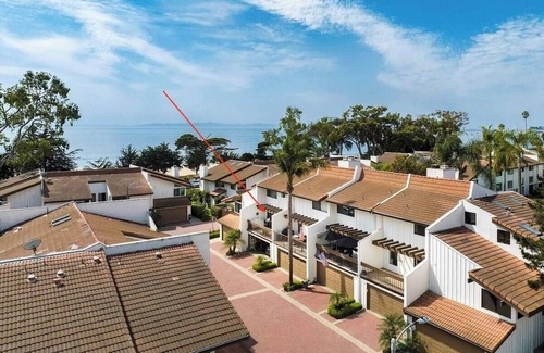 East Beach Condo | 2 bed spacious condo steps from beach + pool!