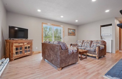 Sturgis Cabin | 2-bedroom, 1 bathroom log cabin Top floor offers the perfect retreat close to downtown Sturgis. With breathtaking views and a peaceful wooded setting, this cozy home-away-from-home. Comfortably accommodating up to 4 guests.