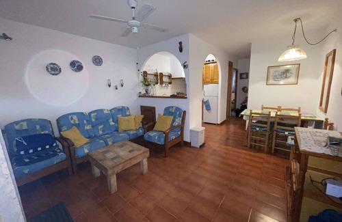 Arenal d'en Castell Apartment | 2 bedroom Apartment With Pool, Shared Gardens And Sea Views