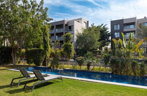 New Cairo House | 2-Bedroom Apart with Garden Views & Pool Access GF