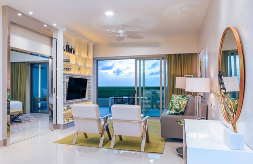 Punta Sam Resort | 2-Bedroom beach resort in Punta Sam with 4 pools, fitness room, WiFi and more