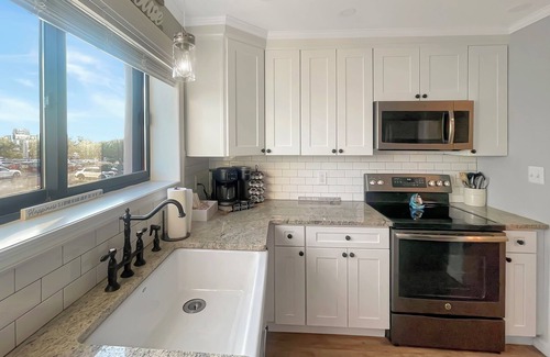 Midtown Ocean City Condo | 2-bedroom condo with wraparound Ocean Views, Arcade, Steps to Boardwalk