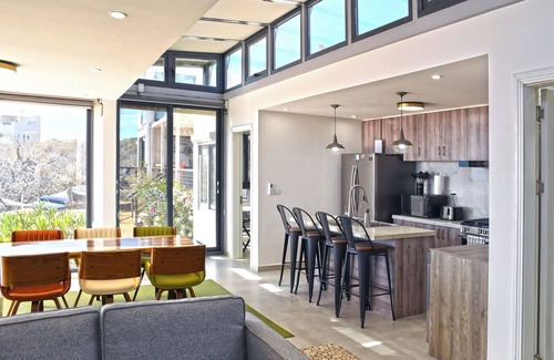 El Sargento House | 2 br,1 bath modern repurposed shipping container home. Enjoy fast 250mb Telmex internet with Starlink backup. Guest storage for diving & kiting/winging gear. Enjoy streaming YouTube TV in each room & complimentary use of inflatable SUPs & beach toys