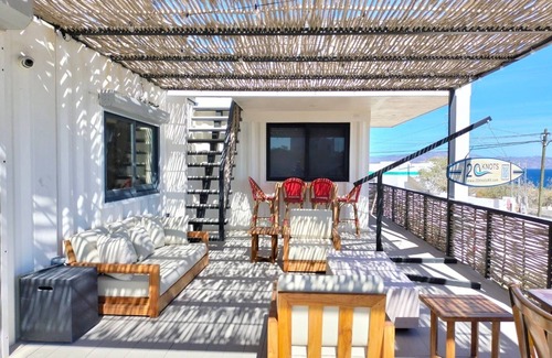 El Sargento House | 2 br,1 bath modern repurposed shipping container home. Enjoy fast 250mb Telmex internet with Starlink backup. Guest storage for diving & kiting/winging gear. Enjoy streaming YouTube TV in each room & complimentary use of inflatable SUPs & beach toys