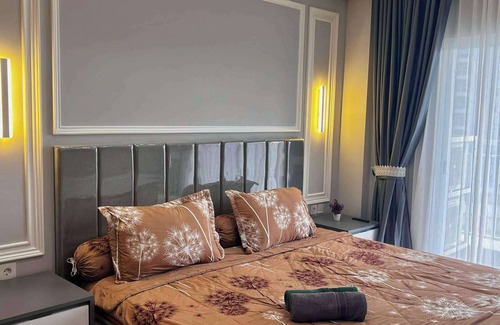 Kesawan Apartment | 2 BR Apartment Plaza View Podomoro City Deli Medan By OLS Studio