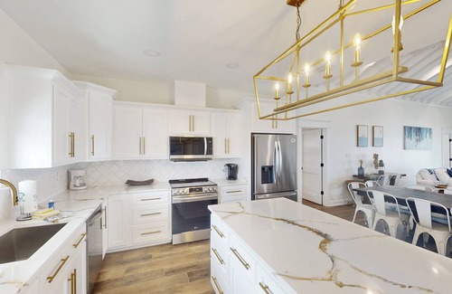 Dauphin Island House | 2 dog-friendly beach houses right on the sand w/private heated pool & elevator