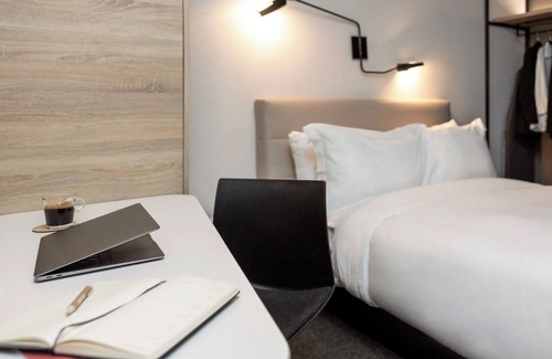 Brossard Hotel | 2 Elegant Rooms Perfect for Guests Seeking Style, Comfort & Accessibility