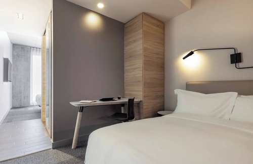 Brossard Hotel | 2 Elegant Rooms Perfect for Guests Seeking Style, Comfort & Accessibility
