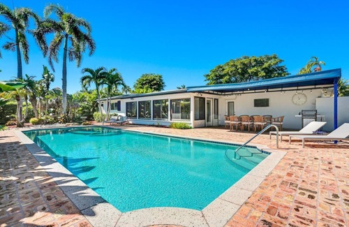 Big Cypress Golf and Country Club House | 2 miles to beach 2 miles to downtown 3bd2bth house Heated SALT Pool,fenced yard.