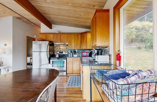 Neahkahnie Beach House | 2-story dog-friendly home with deck, gas grill, woodstove & ocean views