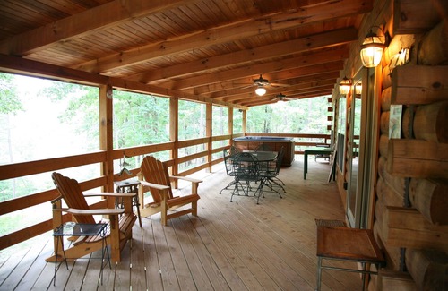 Eureka Springs Cabin | 2 story log cabin on 50 acres. Large fireplace, hot tub, covered porch.