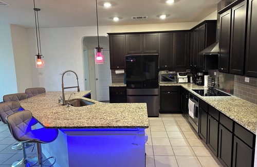 Wetmore House | 2800 Sq ft executive home with arcade game room and complete kitchen amenities.
